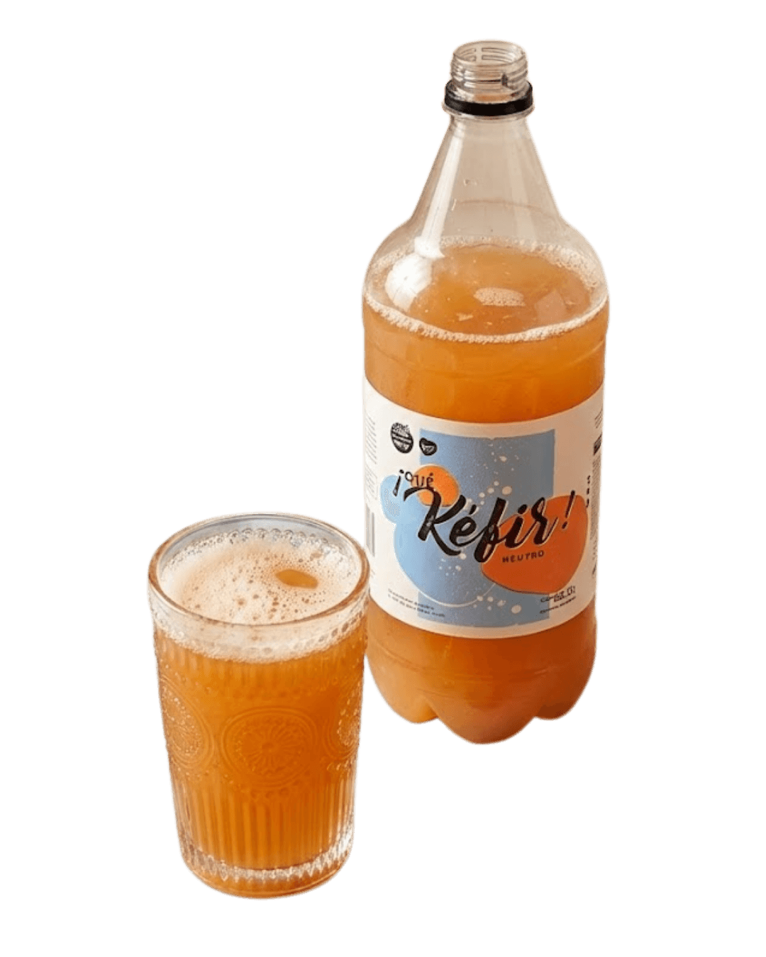 Botella de kéfir y vaso servido
